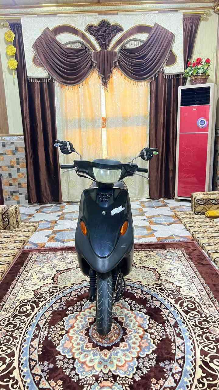سلام عليكم دراجه ياماها  بي جي 9زروف  بسعر ٢٦٠  دراجه حلوه ونضيفه مكينه ناعمه كهربائيات شغاله كلشي شغال نقصها باتري فقط  مكاني بصره تقاطع الكزيزه قرب محكمت الكزيزه رقم هـ/***********  متواجد وتساب
