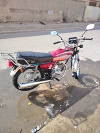 عندي دراجه اربع كير م24 سكنر للبيع 07722353755