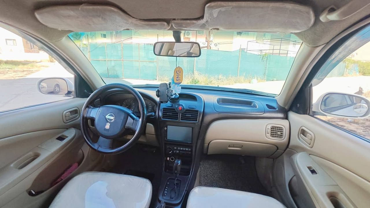 نيسان سني ٢٠٠٧صبغ حزام رقم سنويه دفتر بانزين جاهزه سياره من كلشي تبريد محرك كير بشرط  *********** كركوك, العراق
