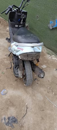 دراجة نارية • مكينة خرسة • كهربائيات جاهزة