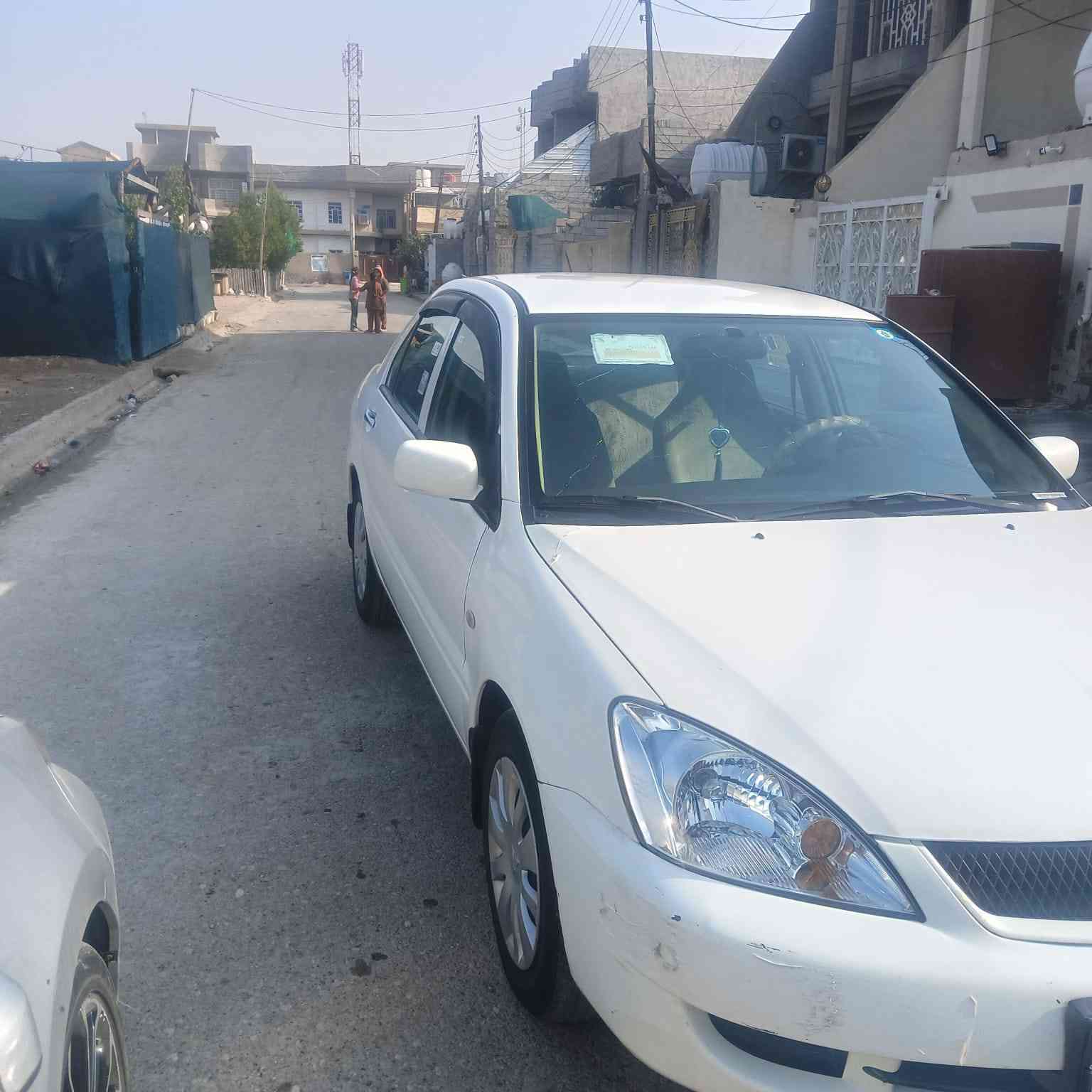 لانسر للبيع موديل ١٠ سياره جديده رقم ديالى بسمي سعر ٨٧  وبيه مجال بسيط مكاني ديالى  ***********
