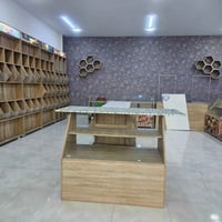 عندي عوارض مال محل حلويات و كرزات للبيع جديد سعره مليونين و نص و بي مج...