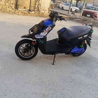 سكنس جبلي شحن  6 بطاريات  ملف 2000  تقطع مسافة 50 كيلو للشحنة  سرعة 60...