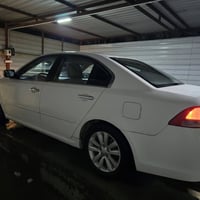 أوبتما ٢٠١٠ • موتور ٢٠٠٠ سي سي • بصمة وفتحة سقف