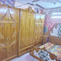 غرفة خشب • ست أبواب • بغداد