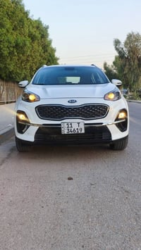 كيا سبورتج موديل 2020 رقم بغداد انكليزي السياره مكفوله من الصبغ والضرب...