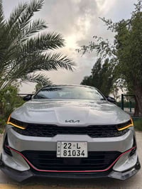 كيا كي فايف 2023 فئه GTLine فول مواصفات لون آسمنتي داخل احمر  ماشيه 36...
