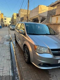 دوج كرفان فئة 30 موديل 2014 بوب كهرباء  كشنات جلد  كشنات امامي تدفئة ث...
