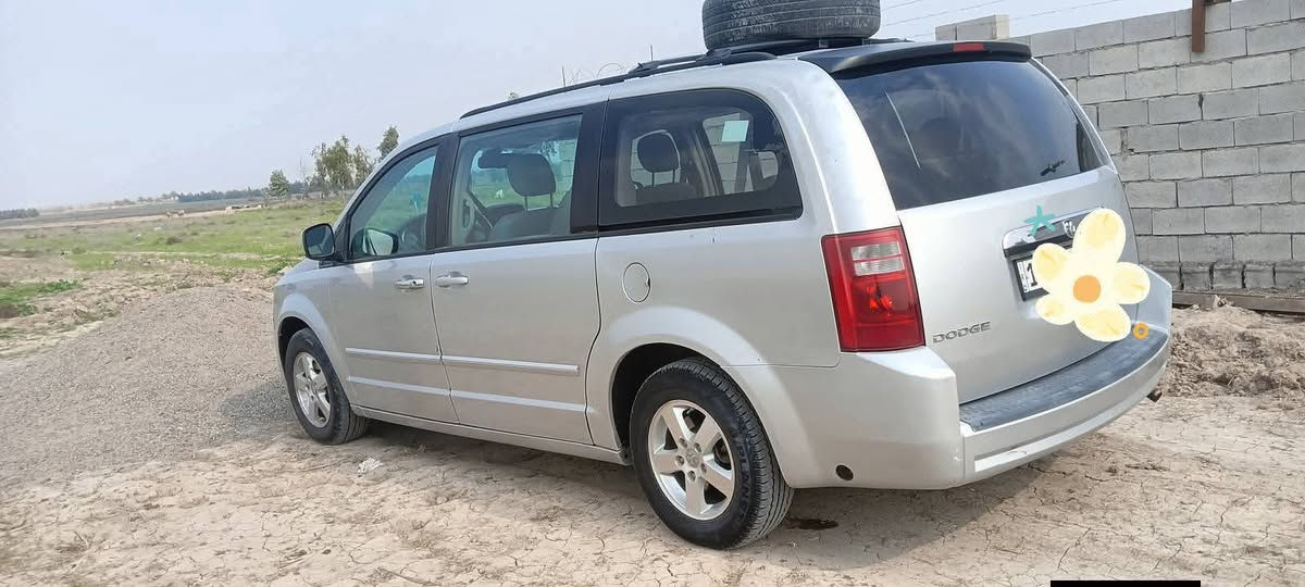 دوج كرفان موديل 2009رقم بغداد دولي بسمي للبيع والمراوس فول  مواصفات 7راكب 3قطع تبريد محرك 3800مكفول كير مكفول حدادية جديدة تخم تاير جديد تبريد تدفئة شغال بوب كهرباء وباب الصندوق كهرباء شاشة وكامرة كشن السائق كهربائي مكان السيارة ديالى السعر 110 للاستفسار الاتصال على الرقم ***********
