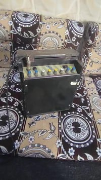 حجم وسط • بطارية جديدة • مايك