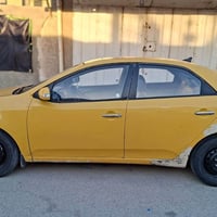 كيا فورتي ٢٠١٠ خليجي محرك 1600 رقم بغداد   تبريد شغال خير من الله تحكم...