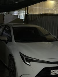 كورلا هايبرد موديل 25 شكل الامريكي فول مواصفات عده الكشنات مو كهرباء و...