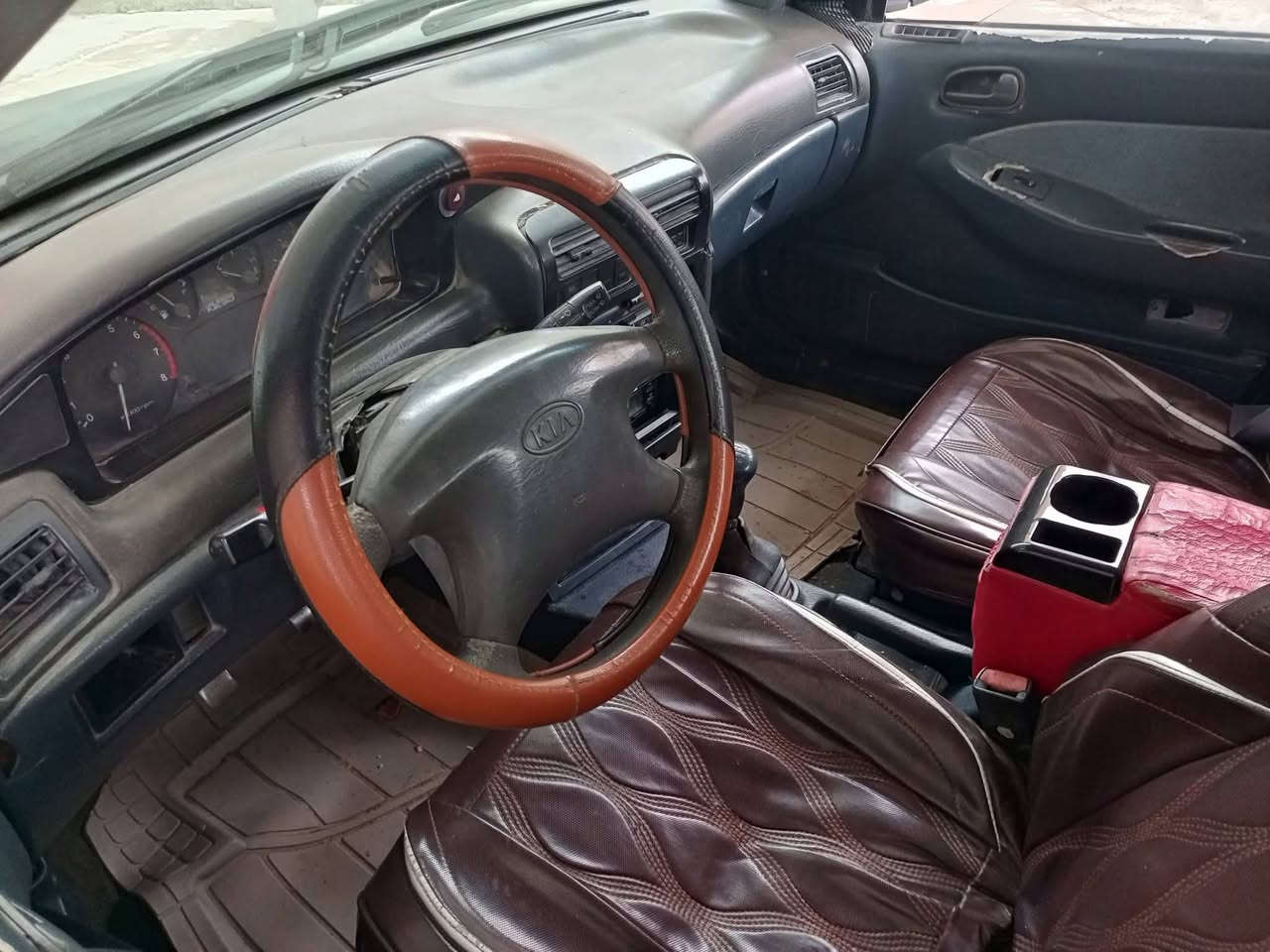 كيا سيفيا 94رقم واسط دولي  كير ومحرك مكفولات لاخياس وال ضربه كلها بلاد وناعمه صدرجديد سعر٢٧وبيها مجال عنوان صويره ***********
