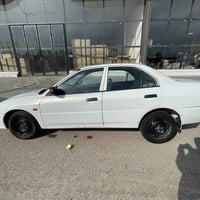 لانسر ياباني مديل 99 رقم بغداد انكليزي مميز هزه وسنويه جديده  كير محرك...