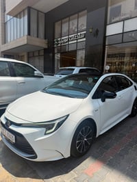 كورلا هايبرد للبيع مكفوله من كلشي بي دعامية الخلفيه بيها صبغ شبرين ماا...