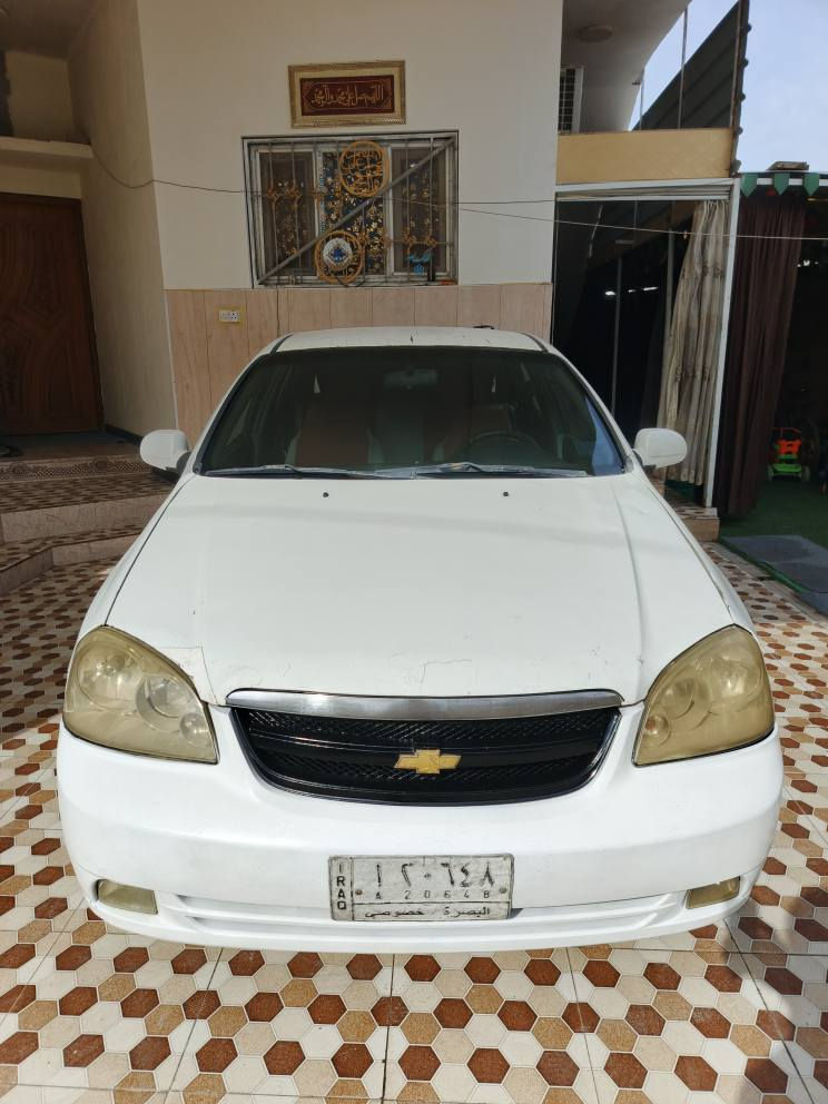 السلام عليكم اوبترا لون ابيض بأسمي سنويه لل ٢٧ السعر ٦٧ بيها مداگر مبدله من خذيتها وبيها تقشر بصبغ القماره بسبب الفابلونه اللاصقه ورشات صبغ بالبنيد ومكينه خير من الله وكير كفاله وبيها تلحيضات حسب ما مبين بالصور يعني رشات صبغ او تصليحات بس السياره بشكل عام حلوه ونظيفه وع ايدي ورقم بصره ومكاني البصره المطيحه  السنيديه والي عاجبه السعر والمواصفات حياه الله هذا رقمي *********** البصرة, العراق
