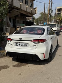 تيوتا كورلا موديل 2025 بلاك ادشن  فول مواصفات   كشتات جلد داخل احمر  ك...