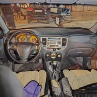 كيا برايد تاكسي 2009للبيع رقم انبار شرط التحويل هيئه وغرمه صغر السياره...