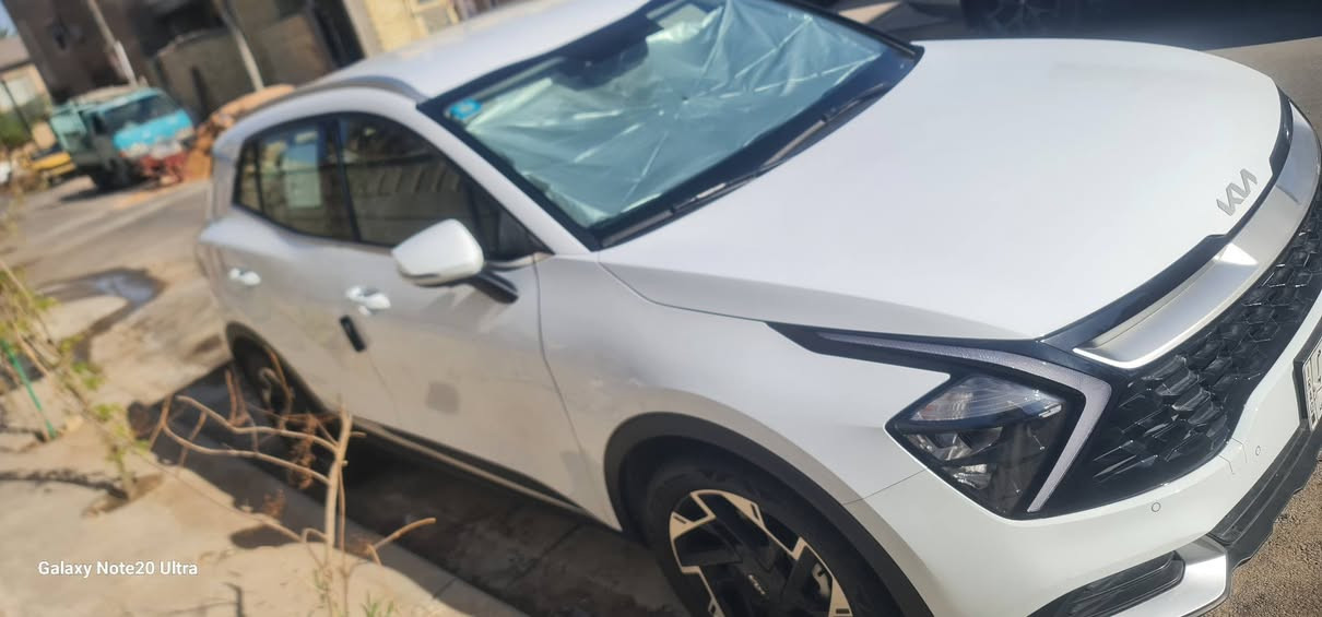 ‏‎السَّلَامُ عَلَيْكُمْ
كيا سبورتاج2023
مرقم بغداد زيرو  ماشية 11000كم السيارة كفالة عامة 
خليجي 
الموديل 2023 قمارة حديد 
دوش سعة المحرك 2.0L
مرتبط بناقل حركة أوتو 6 نمر
عددAIR BAG 2 
حساسات أمامية 
حساسات خلفية
داخل بيجي قماش 
لايت زينون + LED
كشافات 
بك لايت LED
ويل كب 19
4 دسك
اريل نفكيتر 
مفتاح التشغيل بصمة
تشغيل عن بعد   
شاشة Apple Car play
كاميرا دوارة   
حركة المقاعد الأمامية كهرباء
تدفئة المقاعد الأمامية 
تدفئة المقود 
تتسع المقصورة ل 5 ركاب
مثبت السرعة Cruise
المودات والأوامر الصوتية
أوضاع القيادة  Drive Mode
فحص أنظمة السيارة  
شفتات مقود
قطعتين تبريد
هاند بريك كهرباء 
‏ABS 
‏Auto Hold   أوتو هولد
نظام مانع الانزلاق
نظام نزول المنحدرات 
اشارة في المرايا الجانبية
مخرج منفذ الطاقة 
‏Bluetooth 
شاحن هاتف Wireless 
للاستفسار ***********
اخوان غير متواجد عالفيس الرجاء التواصل عالرقم واتس
