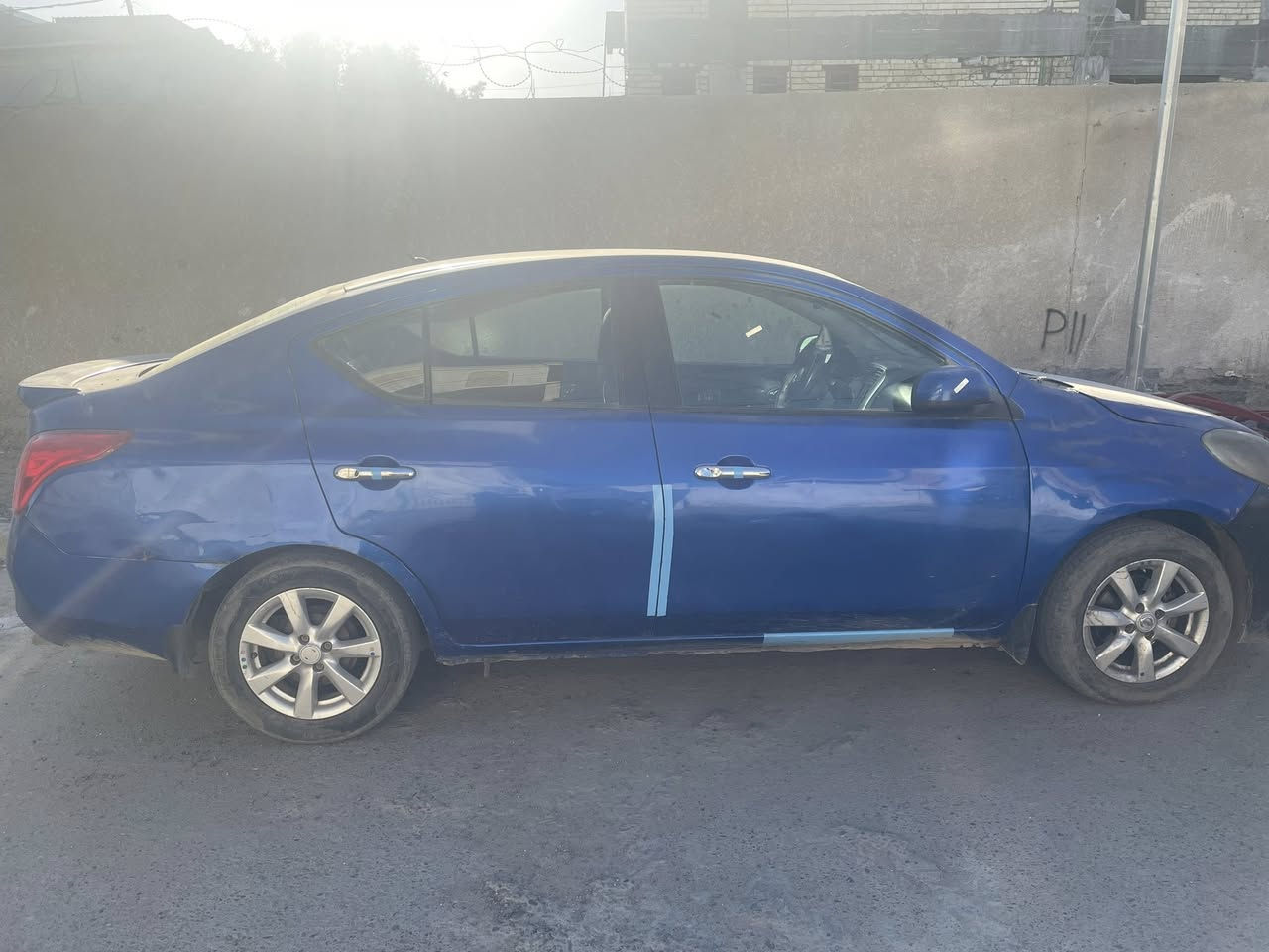 سلام عليكم نيسان فيرسا2014 رقم بغداد للبيع السعر65   الكير بي مشكلةتلفون***********
