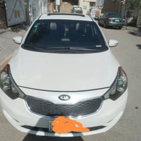 كيا فورتي ١٤ وارد أمريكي محرك Gti  فول مواصفات ابيض صدفي رقم بغداد باس...