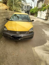لانسر • موديل 2008 • رقم بغداد • ناقل حركة اوتوماتيك • منظومة غاز • مح...