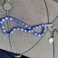 سبحة عين القط نضيفة جدأ واليراتها فضة عيار 925للبيع السعر 60وبي مجال  ...