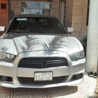 للبيع جارجر 2013 ضرر جاملغ أيسر وشوي من الباب السايق ... مواصفات sxt  ...