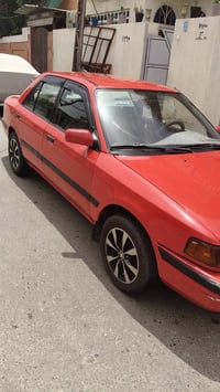 للبيع سيارة مازدا موديل 1994 گير توماتيك  ما بيها اي قطع تبديل  رقم ان...