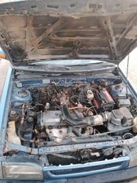 مازدا ٣٢٣ • ٩٤ • رقم بغداد