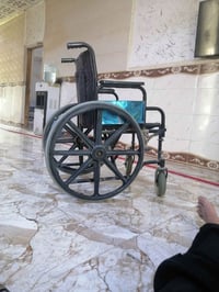 عربانة معوقين • كرسي متحرك