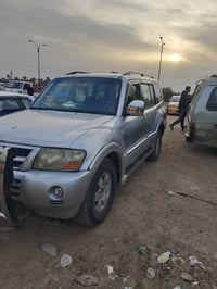 باجيرو 2005 رقم بغداد نكليزي بأسمي رقم مميز محرك 3000 سياره مجفيه محرك...