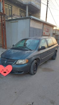 دوج كرفان 2006 رقم بغداد  باسمي  تحويل ثاني يوم شاصي طويل قطعه وحده تب...