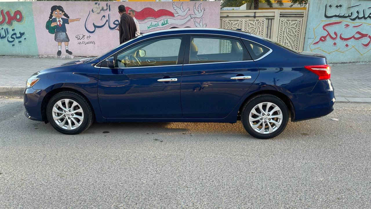 نيسان سينترا 2018  (وارد أمريكي)🇺🇸
مواصفات SV
مثبت سرعه 
نظام قياده ECO  
تحكم ستيرن جهتين 
رادار امامي 
 بصمه تشغيل
وبصمة ابواب وجنطه
محرك 1.8  مكفول
كاميرة بلاديه 
صدر امامي وخلفي كله جديد 
ماشيه  ٩٧ الف ميل  
رقم  السيارة (اربيل) با أسمي 
السنوية منتهيه سنة ٢٠٢٤
السعر  9,600 ( تسعة الاف وستمائة دولار) 
الضرر كما موضح في الصور 
مع باب السائق بيه طخه ومصلح   
مكان السياره  بغداد - الكرخ
للاستفسار اتصل (  ***********  )
￼￼
￼

