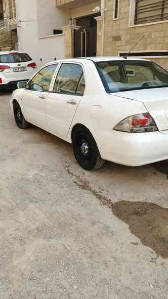 سلام وعليكم مرخصت ادمن 
لانسر للبيع 
مديل 2010
السياره بيهه سونار داخل الصور فقط ملاحضات
المكينه 1500 بيهه خيط تبخير فقط

كير اوتو خير من الله 
عنوان السياره بغداد البلديات 
رقم السياره كربلاء (19)
كلشي شغال علبلاد
رقم الهاتف ***********
