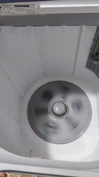 غساله ايلجي اصلي نضيفه جدا 18كيلو 07709718300