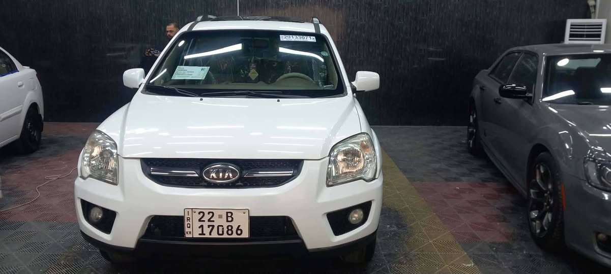 كيا سبورتج موديل 2010؛بدون صبغ بدون بارد محرك ما مفتوح 20 رقم اربيل جديد سنويه جديده هزي السيارة بسمي شرط التحويل السيارة.  داخل لونين داخل صاج    ماشيه ١٧٠ حقيقي مواصفات فتحه سقف حساسات. خلفية تبريد لمس شاشه كامري رقم الجوال *********** الشراي يتصل المكان القياره حاج علي
