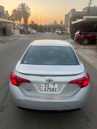 كورلا2018se رقم بغداد هزة وسنوية ورقم جدد ماشية ١٤٠الف كير ومكينة وصدر...