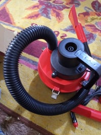 مكنسة سيارة • تشتغل على ولاعة