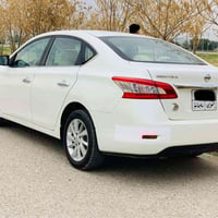 نیسان سێنترا 2019 سپی سەدەف   وێنەی سۆنەریم داناوە سەیارەکە بێبۆیاخە  ...