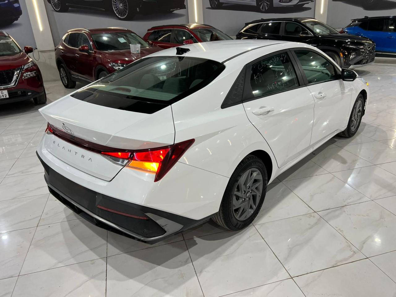 🚘 Hyundai Elantra SEL 2024
لون أبيض – سيارة نظيفة واقتصادية

▪️ الموديل: 2024
▪️ الفئة: SEL
▪️ اللون: أبيض
▪️ الحالة: بدون صبغ
▪️ الحادث: دعامية فقط
▪️ الترقيم: تترقم شمالي فقط

🔧 المواصفات:
 • محرك 2.0 لتر
 • 4 سلندر
 • قوة 147 حصان
 • قير أوتوماتيك CVT
 • شاشة وسطية كبيرة
 • شاشة عدادات ديجيتال
 • Apple CarPlay & Android Auto
 • كاميرا خلفية
 • بصمة تشغيل
 • مثبت سرعة
 • تحكم بالمقود
 • بلوتوث
 • جنوط ألمنيوم
 • نظام مانع التصادم
 • تحذير النقطة العمياء
 • صندوق ذكي

💰 السعر: 145 وبيه مجال بسيط

📍 الموقع: أربيل
📞 للاستفسار: ***********

🔥 عروض يومية لجميع أنواع السيارات
انضم إلى كروب الواتساب 👇
https://chat.whatsapp.com/EDt5rlTuPdfCvNySuhJZE1?mode=hq2tcli

✔️ يوجد لدينا كافة أنواع السيارات.
