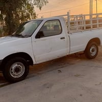 للبيع فقط نيسان 2002 رقم بابل جديد بيها صبغ قطعتين.و بيها تگشير صبغ بس...