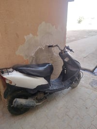 دراجة نارية • كربريتر يحتاج تنظيف • العمارات الجديده