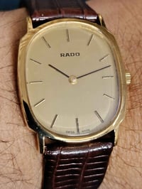 رادو • طلاء ذهب • نظيفة