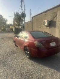 عندي جيلي ام كراند مديل 12سياره حلوه مكينه وكير كورلاه رقم بغداد مشروع...