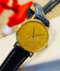 يونيفرسال جنيف • عيار 18 • ٣٤مم