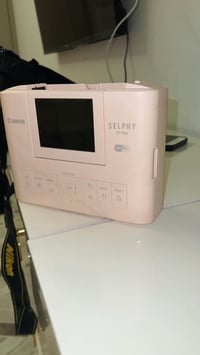 كاميرا جديدة  ماركةNikon مع جهاز يعمل الصور كرت سعرهون 225ومجال اتصال ...