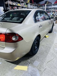 اوبتما ٢٠٠٨ • مكينة ٢٠٠٤ • رقم بغداد