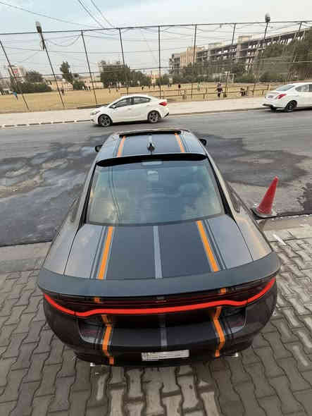 جارجر RT  محرك 5700
موديل 2020 رقم بغداد 
ماشيه 53M
فوول مواصفات 
فتحه 
شاشه كبيره كار بلي 
تبريد تدفئة بالكشنات 
كشن خلفي تدفئة 
كشنات كهرباء 
خزن وضعيات جلوس
ردارات جانبيه 
مري تعتيم رويه 
سياره كلش جديده ما عايزه شي 
كير محرك تبريد شرط
مراوس فقط 
حادث : فقط جاملغ مبدل اصلي  وبنيد بدون حادث نفسه راجع بس فاتحي يعني قطعه وحده بيها  
***********
