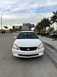 لانسر ٢٠٠٦ • مزاد الداخلية • مكينة وكير ممتازه